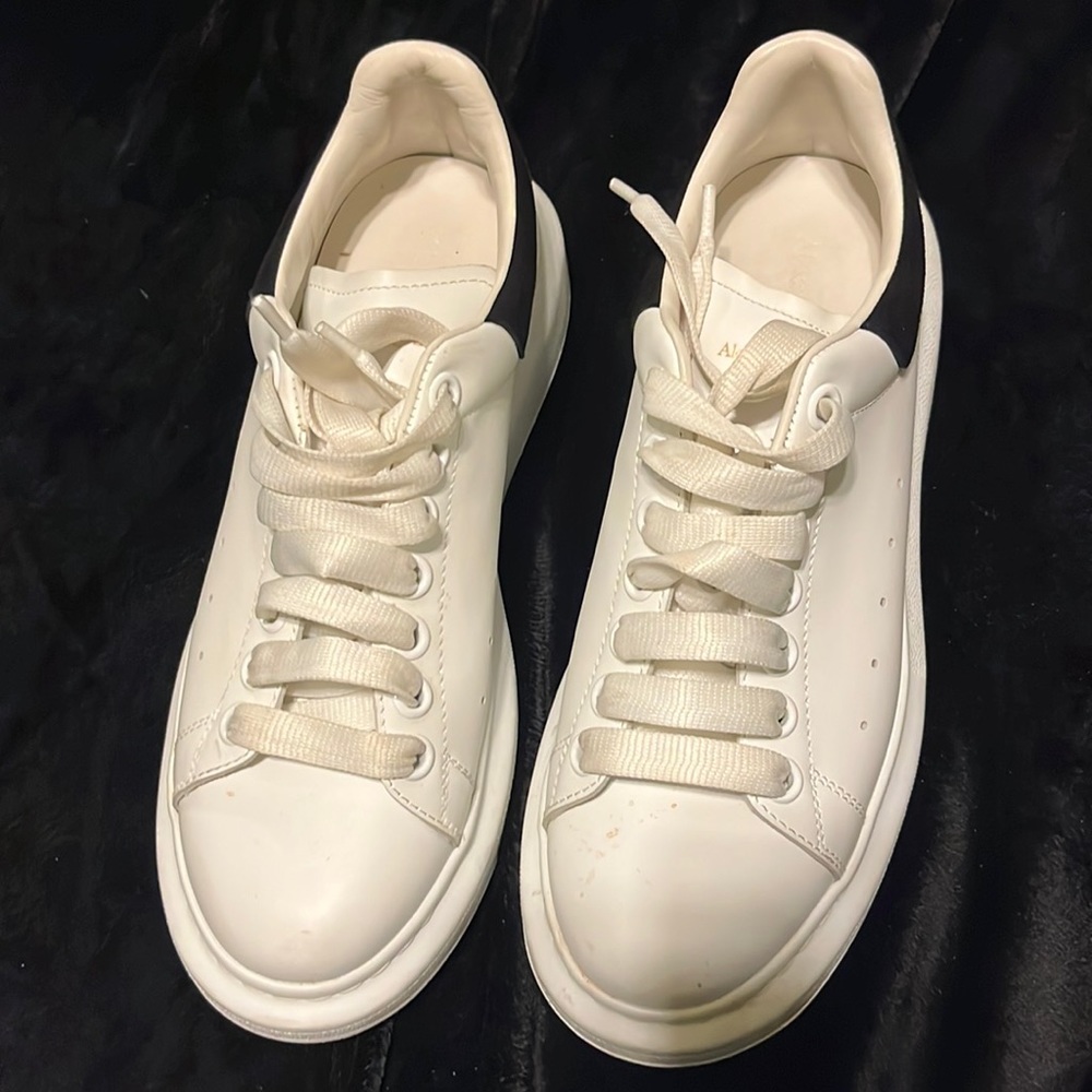 Worn a few time. Still look good. Alexander McQueens. Just don't want anymore.